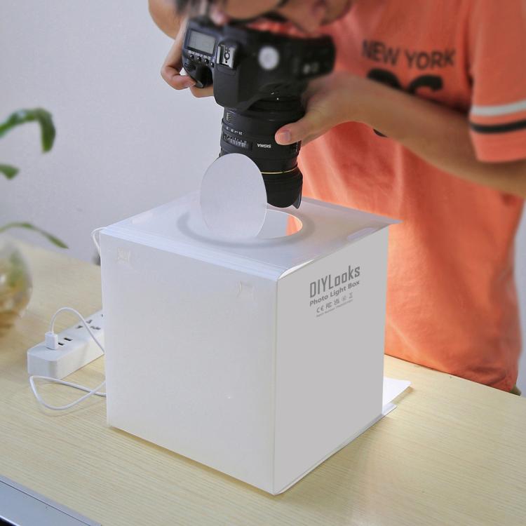 Kit de estudio fotográfico plegable portátil con panel LED anular de 23 cm, incluye 6 fondos de colores (negro, blanco, amarillo, rojo, verde y azul). Tamaño desplegado: 24 cm x 23 cm x 23 cm.