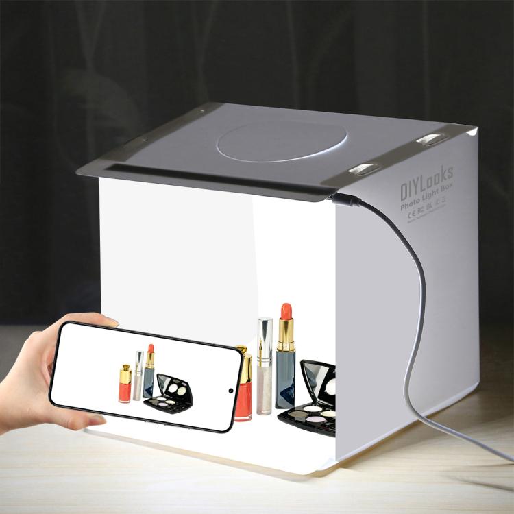 Kit de estudio fotográfico plegable portátil PULUZ de 20 cm con 550 lúmenes y dos fondos de colores (negro y blanco). Tamaño desplegado: 24 cm x 23 cm x 23 cm.