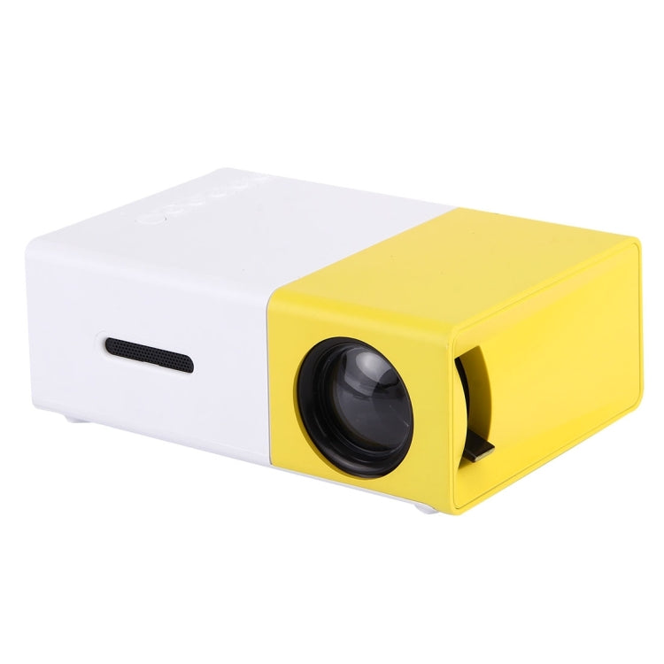 YG-300 0.8-2M 24-60 pulgadas 400-600 lúmenes Proyector LED Cine en casa HD con cable de conversión de video 3 en 1 y control remoto, Tamaño: 12.6 x 8.6 x 4.6 cm, Enchufe de la UE