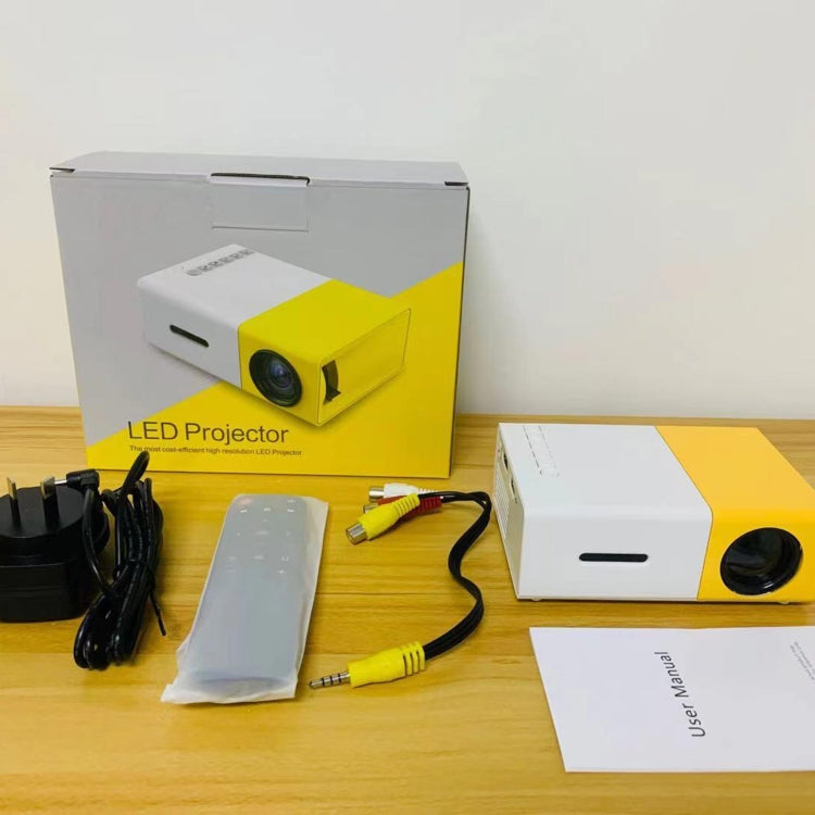 Mini proyector LED portátil de cine en casa YG300 400LM con control remoto, compatible con interfaces HDMI, AV, SD y USB