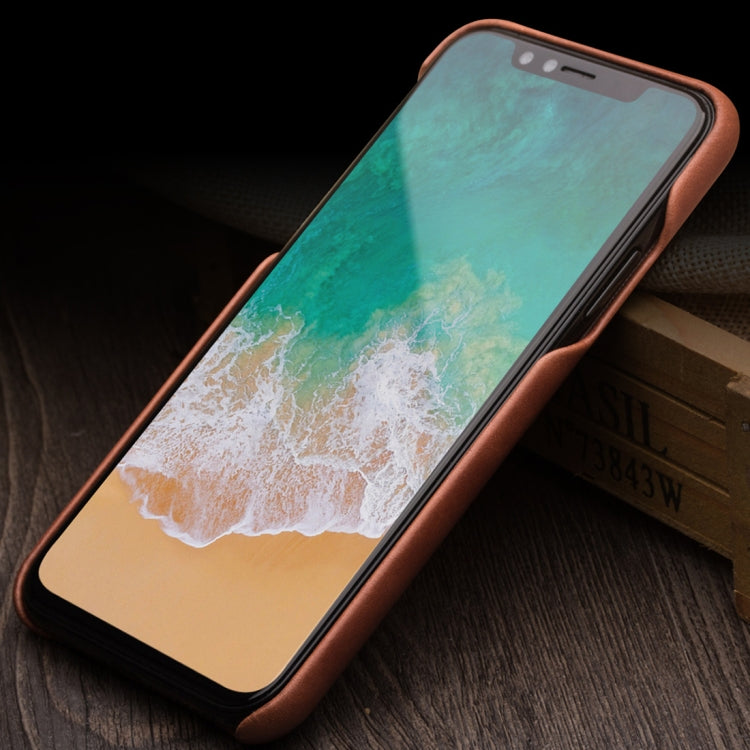 Para iPhone X / XS QIALINO Funda protectora de cuero de vaca a prueba de golpes con ranura para tarjeta