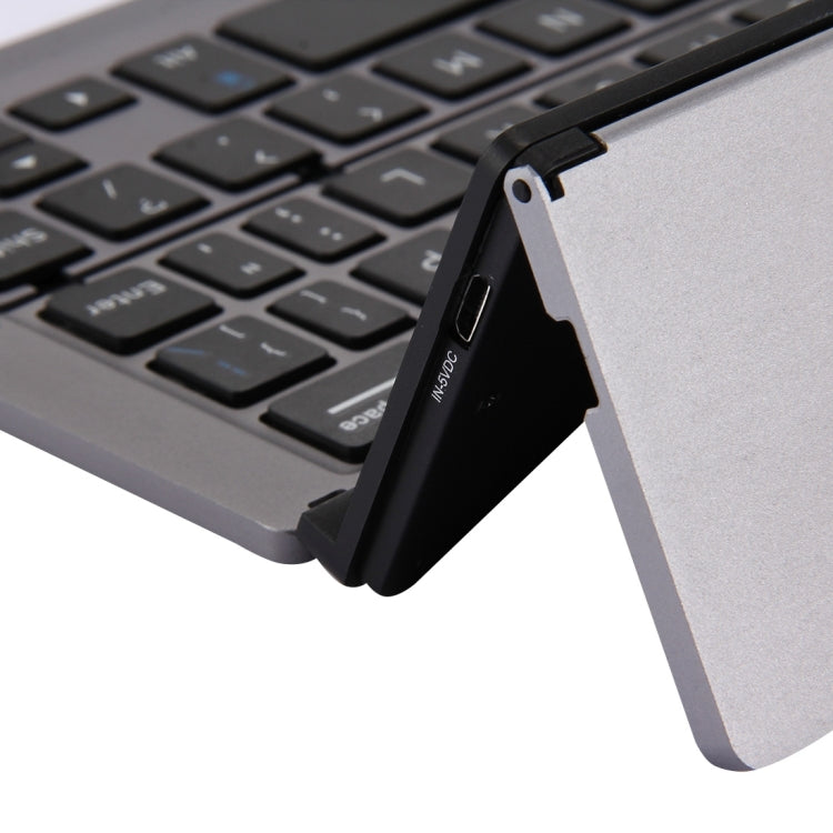 Teclado inalámbrico Bluetooth plegable, recargable, ultradelgado, F18, 58 teclas, con soporte