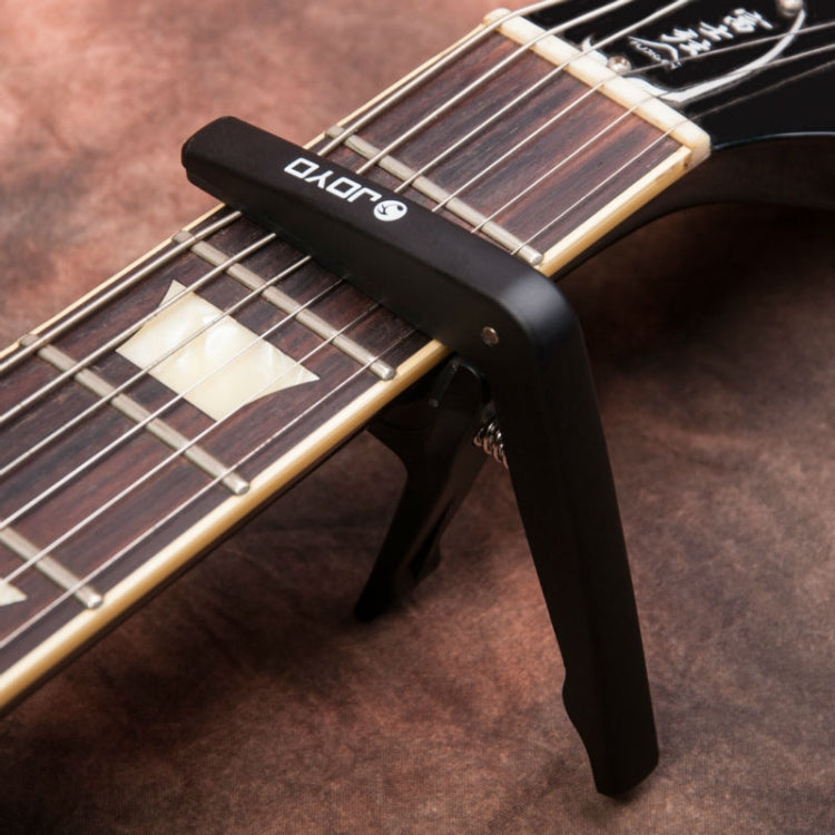 JOYO JCP-01 Cejilla para guitarra Cejilla para ukelele ligera de acero plástico, JCP-01