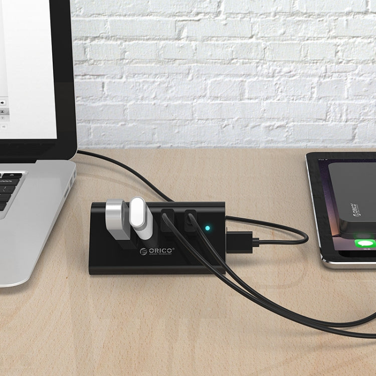 ORICO SHC-U3 HUB USB 3.0 de 4 puertos de escritorio de material ABS con soporte para teléfono/tableta y cable USB de 1 m e indicador LED, SHC-U3
