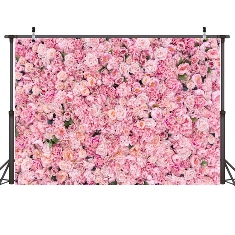 Tela rosa con fondo de pared de rosas