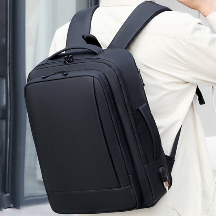 Mochila para computadora portátil impermeable y expandible para negocios con puerto USB
