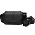Bolso bandolera QISEMIAN todo en uno para fotografía de hombre con compartimento extraíble para cámara y soporte para trípode.
