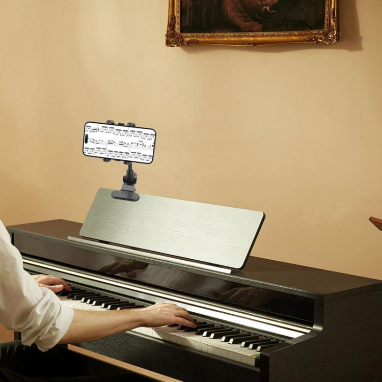 Soporte universal para teléfono para grabar vídeos de enseñanza en directo de guitarra, bajo y ukelele.