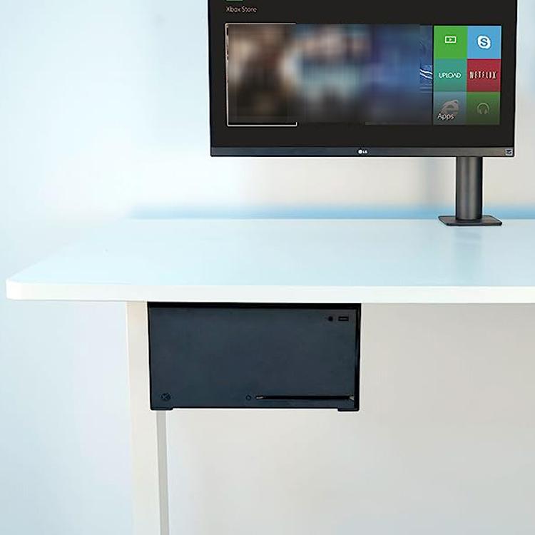 Soporte organizador oculto de metal para montaje debajo del escritorio de Xbox Series X que ahorra espacio.