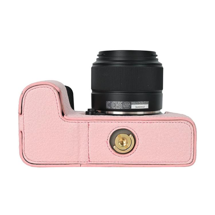 Funda de piel sintética para cámara Fujifilm X-S10 con estampado vintage de lichi y base protectora inferior con acceso magnético a la batería.